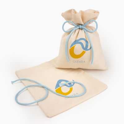 Personalised cotton pouch with coloured strings and loose closure